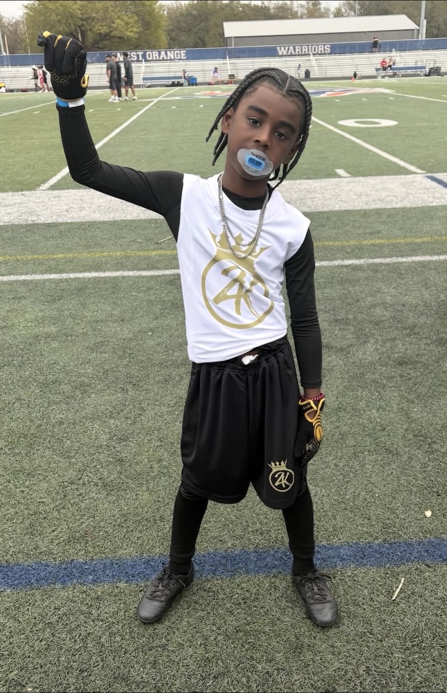 Jace Garcia on the field after a football game