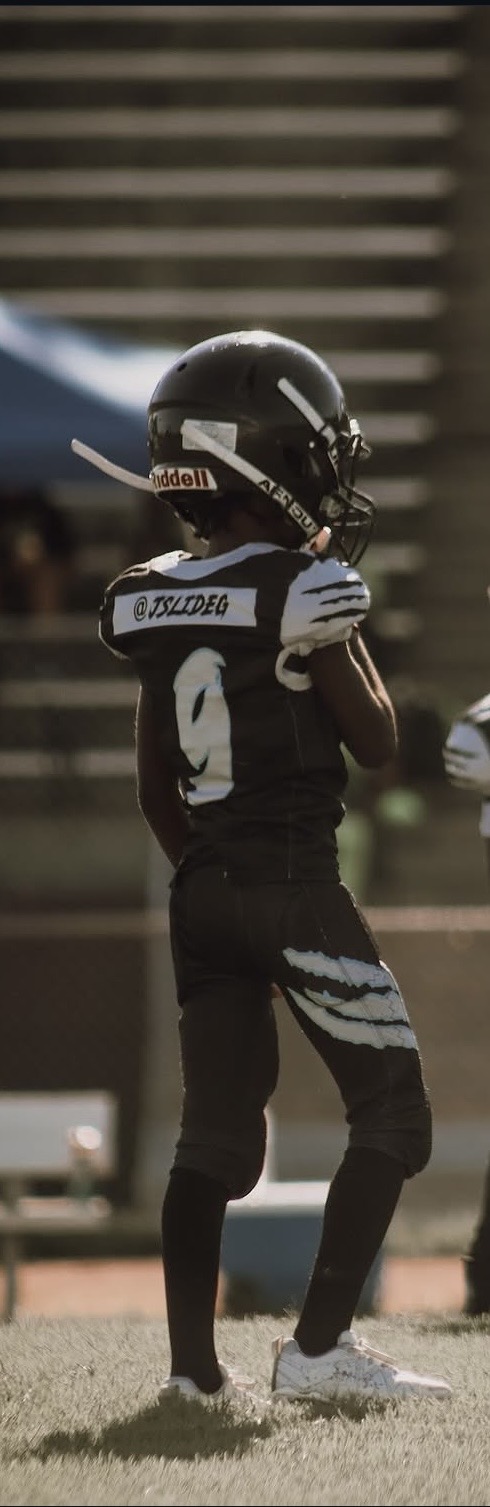 Jace Garcia in black number 9 football uniform