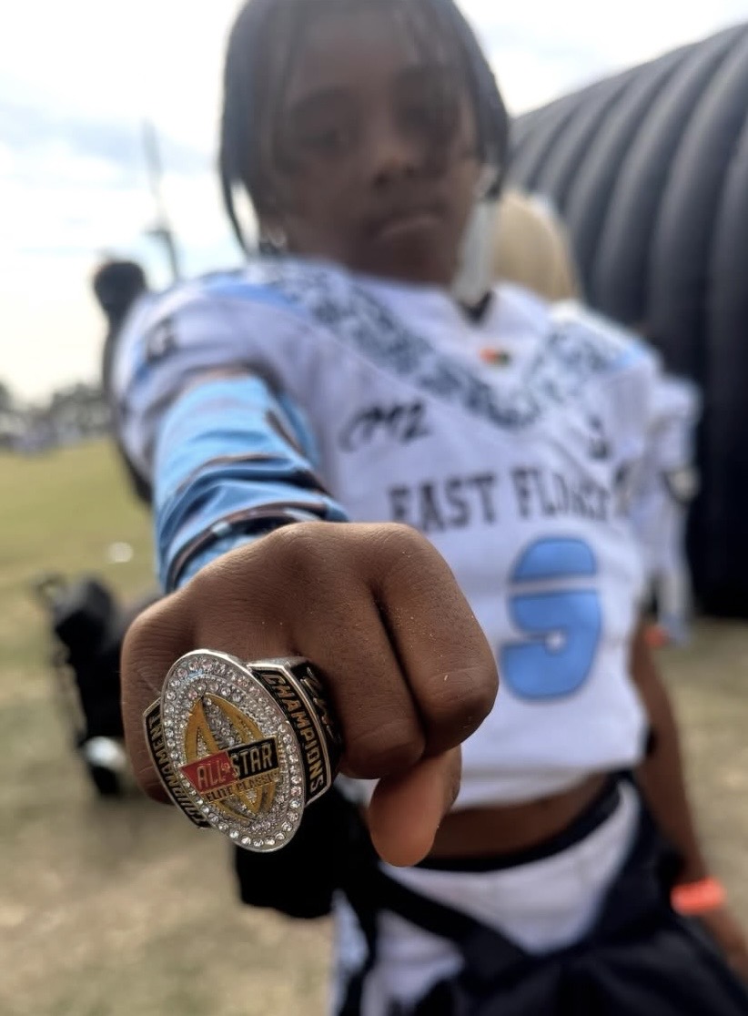 Jace Garcia showing a championship ring